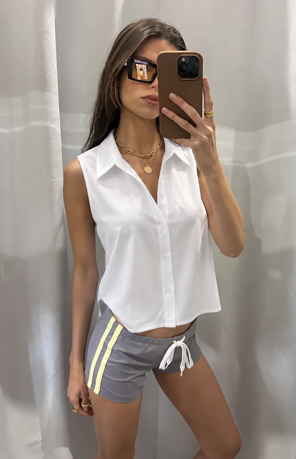 Women’s Sleeveless Button Down V Neck Shirt